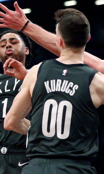 Russell scores 27, Nets hit 19 3s and beat Nuggets 135-130